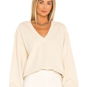 Agolde v neck balloon sleeve sweater.